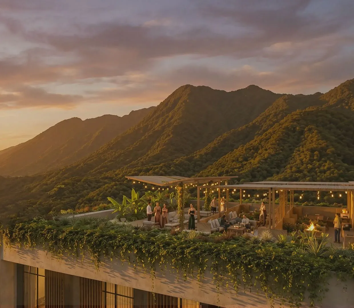 Rooftop de Maya Residences al atardecer con vista a las montañas